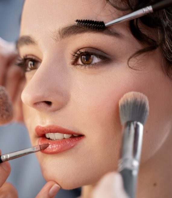 make-up-artist-getting-model-ready-photoshootin_23-2149305147